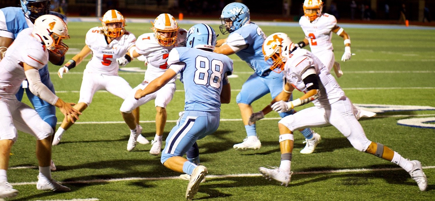 Mineola Yellowjackets, from left, Coy Anderson (4), Brady Shrum (5), Adam Blalock (7) and Julian Ramos (6) converge on the West Rusk ball carrier.  [see more sights form the sidelines]